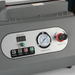 Close-up of Q20 machine control panel with pressure and speed settings