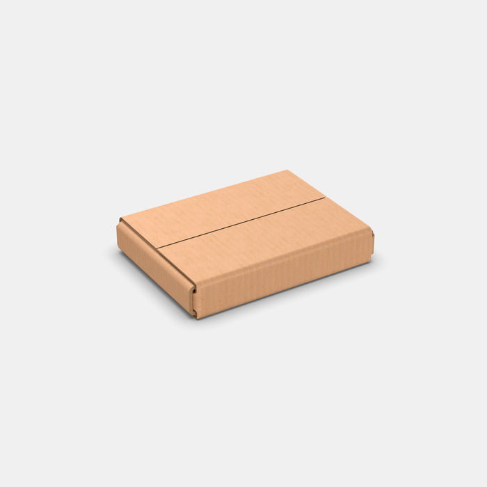 PAKFUL Universal XS 50% parcel box 210×155×40 mm – closed cardboard box on white background